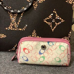 Coach cosmetic pouch.